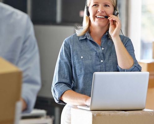 Person working wearing a phone headset.