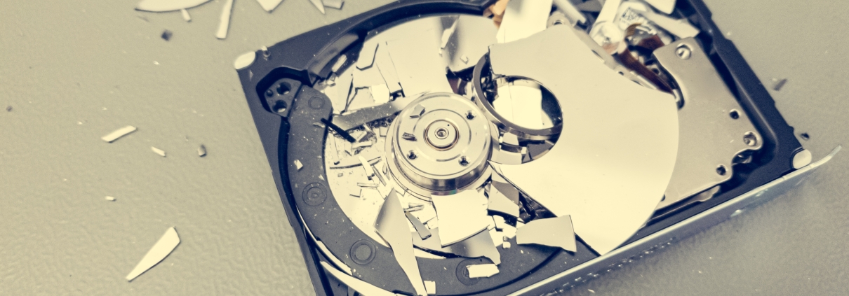 Broken,Computer,Hard,Disk,On,A,Table,-,Complete,Data