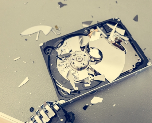 Broken,Computer,Hard,Disk,On,A,Table,-,Complete,Data