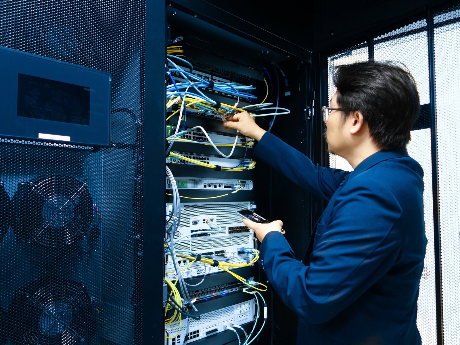 Decommissioning server units as a part of asset removal efforts.