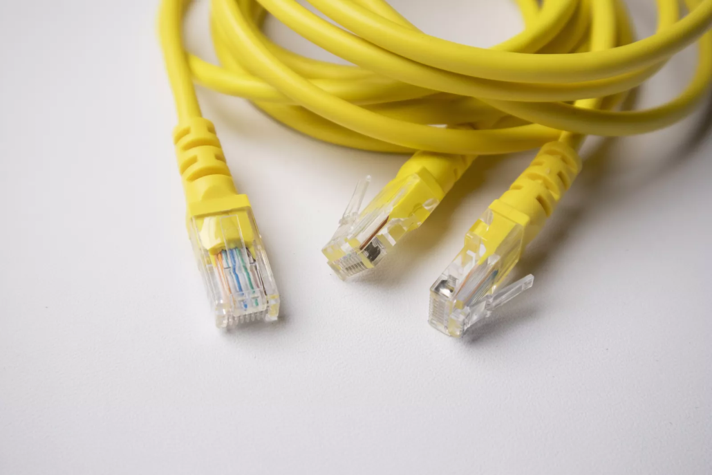 Coiled Ethernet cables ready for recycling pickup and sorting