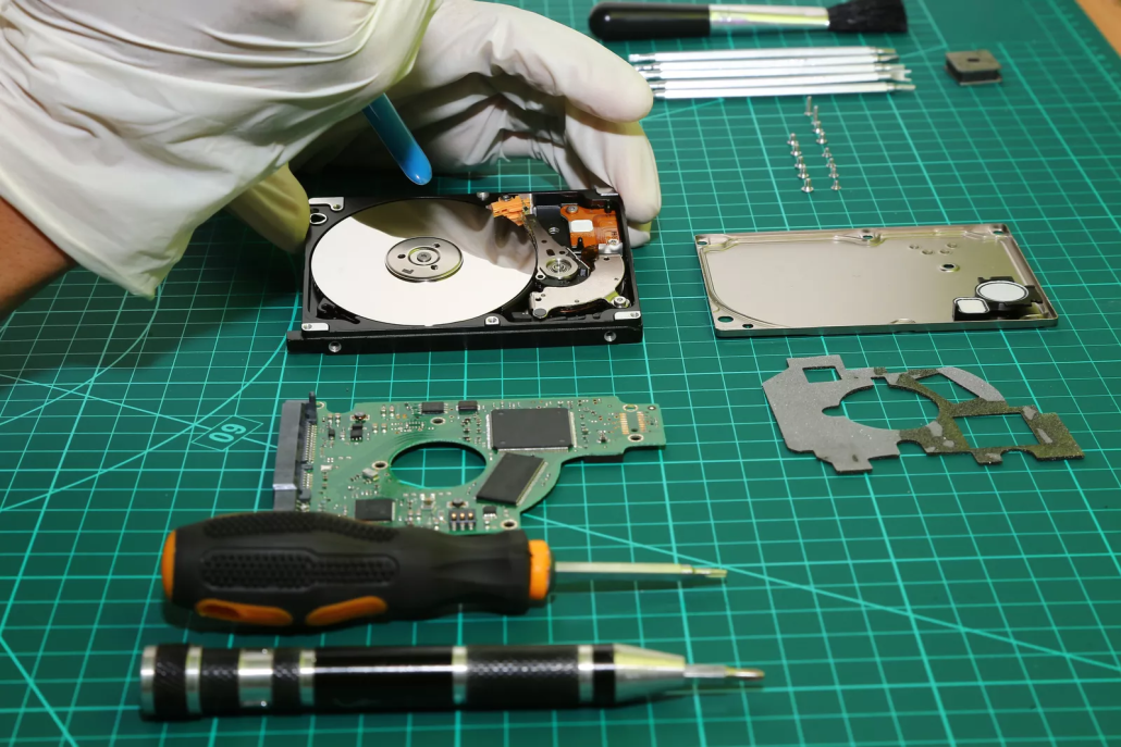 Hard drives undergoing certified destruction to protect sensitive data