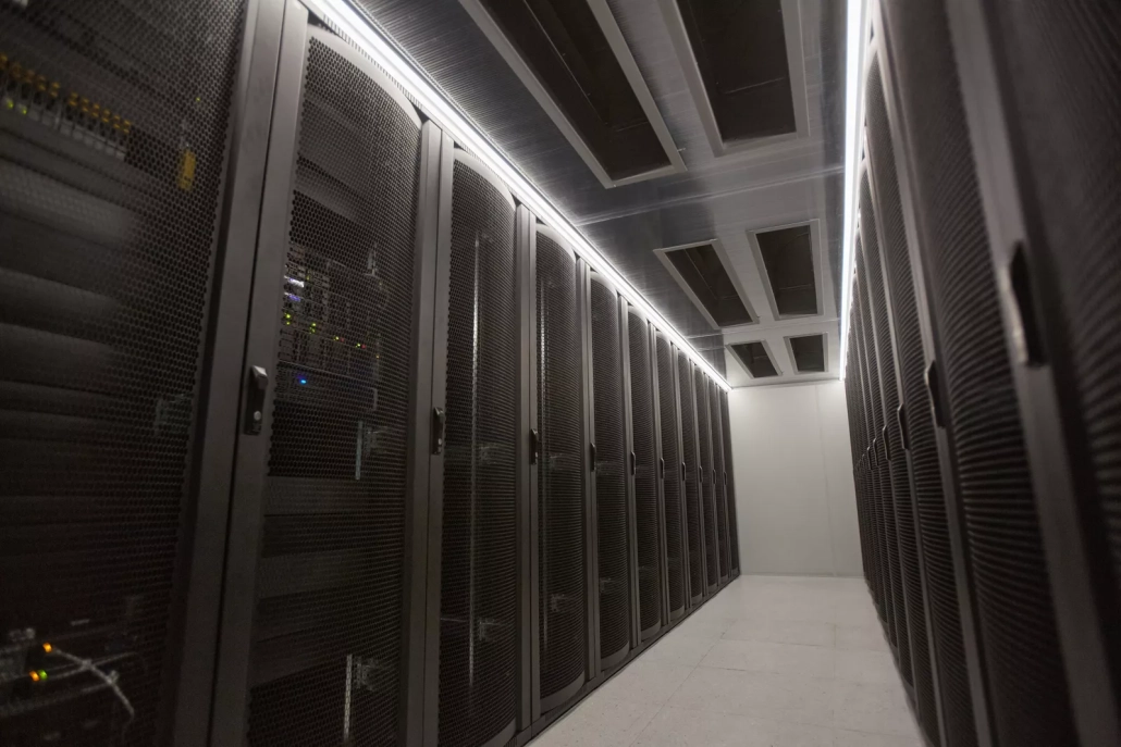 Surplus servers and networking equipment securely staged during data center consolidation